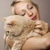 blonde woman hugging cat