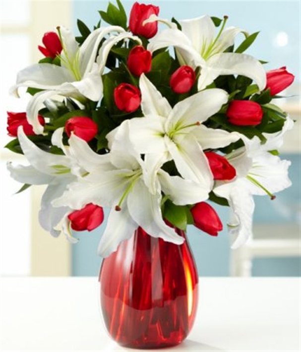Vase with lilies showing the big stamens you should snip off