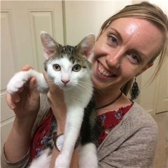 Volunteer Beki with foster cat Panda