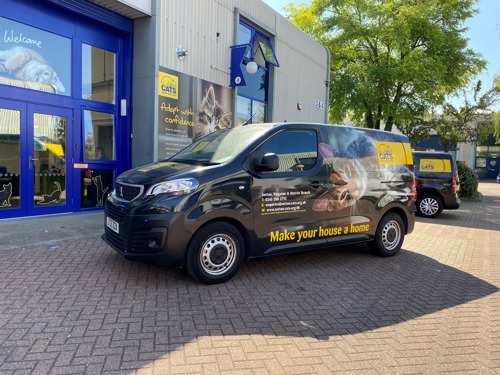 Cats Protection branded van parked outside Cats Protection adoption centre