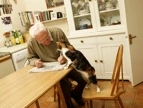 elderly man with cat