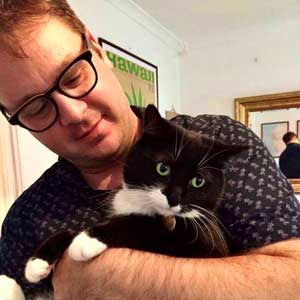 Tim with his cat Baloo