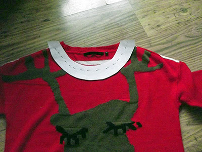 stitch pattern laid over collar of christmas jumper