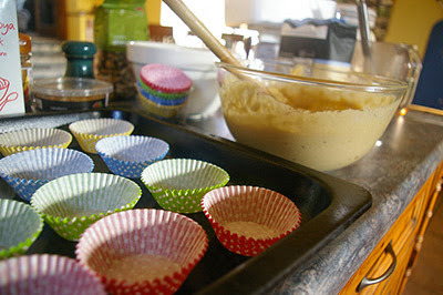 cake mixture ready to go in cupcake cases