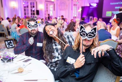 three men wearing cat masks at the 2018 National Cat Awards