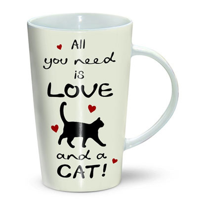 White mug that says 'All you need is love and a cat'