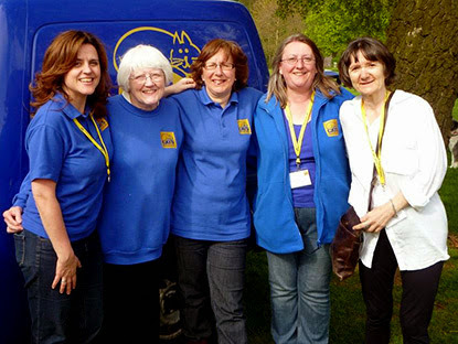 women in Cats Protection jumpers by Cats Protection van