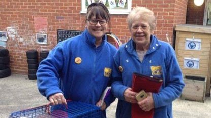 Cats Protection volunteers in blue fleeces