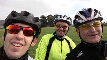 three male cyclists