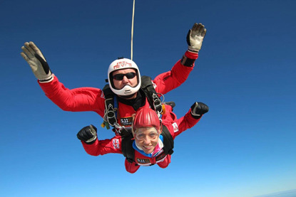 woman and man doing tandem skydive