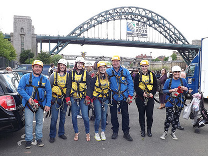 group of zip wire fundraisers in Cats Protection vests
