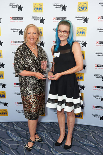 Winner of Most Caring Cat Award (Arthur) Emily Hatton with Deborah Meaden at 2018 National Cat Awards