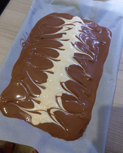 melting white and milk chocolate for a chocolate slab