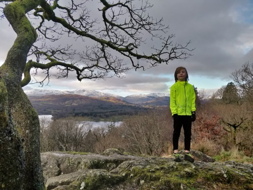 Cats Protection Joss Child standing in front of mountain in hi vis jacket