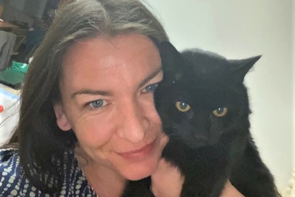 Charity worker’s emotional reunion with cat missing for 13 years