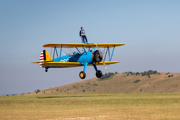 Two senior thrill-seekers take to the skies for daring wing-walk