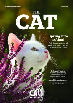 Cover of The Cat magazine spring 2026 issue, featuring an image of a white cat among pink flowers