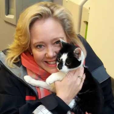 Furry stowaway is reunited with her family